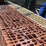 Reinforcement of masonry base with cladding using basalt mesh