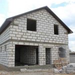 Step-by-step construction of a house made of aerated concrete